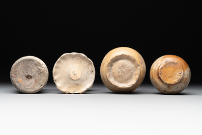 14 German stoneware jugs, mugs and vessels, 14/16th C.