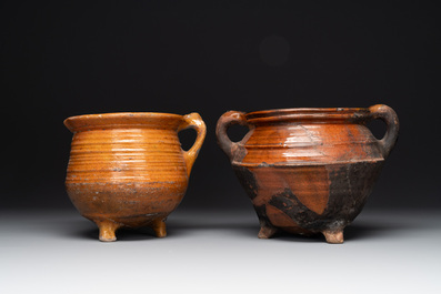 A collection of 10 parcel-glazed pottery so-called &lsquo;grapen&rsquo;, tripod cooking pots, 14th/17th C.