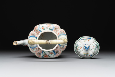 A Chinese famille verte 'flower and butterfly' teapot with an upright handle, Kangxi