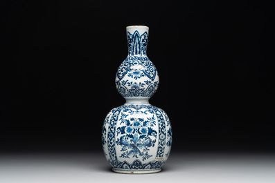 A Dutch Delft blue and white double gourd vase, Pieter Kam, ca. 1700