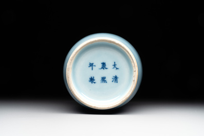 Three Chinese turquoise-glazed covered vases and a lavender-blue-glazed vase, Kangxi mark, 19/20th C.