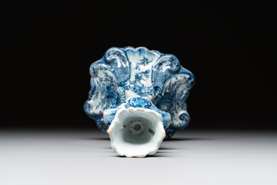A Dutch Delft blue and white candle holder, 18th C.
