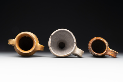 14 German stoneware jugs, mugs and vessels, 14/16th C.