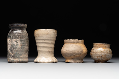 14 German stoneware jugs, mugs and vessels, 14/16th C.