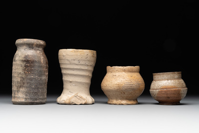 14 German stoneware jugs, mugs and vessels, 14/16th C.