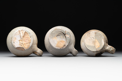 14 German stoneware jugs, mugs and vessels, 14/16th C.
