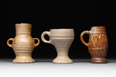 14 German stoneware jugs, mugs and vessels, 14/16th C.