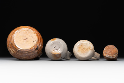 14 German stoneware jugs, mugs and vessels, 14/16th C.