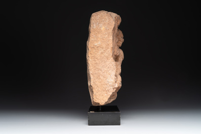 An Indian architectural red sandstone fragment with a divinity, 13th C.