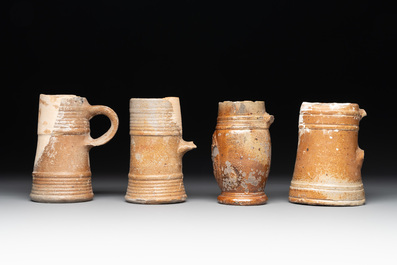 18 German stoneware jugs, mugs and vessels, 15th C. and later