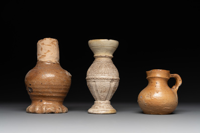 18 German stoneware jugs, mugs and vessels, 15th C. and later
