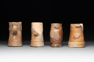 18 German stoneware jugs, mugs and vessels, 15th C. and later