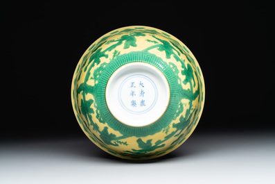 An imperial Chinese green-enamelled yellow-ground 'playing boys' bowl, Yongzheng mark and of the period