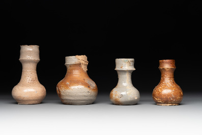 18 German stoneware jugs, mugs and vessels, 15th C. and later