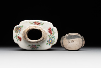 A Chinese famille rose tea caddy, two covered milk jugs and three vases, Yongzheng/Qianlong