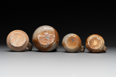 18 German stoneware jugs, mugs and vessels, 15th C. and later