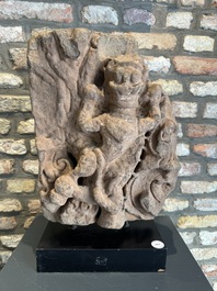 An Indian architectural red sandstone fragment with a divinity, 13th C.