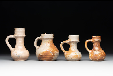 18 German stoneware jugs, mugs and vessels, 15th C. and later