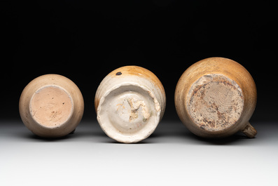 18 German stoneware jugs, mugs and vessels, 15th C. and later