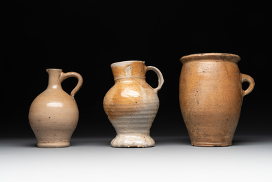 18 German stoneware jugs, mugs and vessels, 15th C. and later