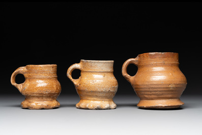 A collection of 10 German stoneware mugs, 14/16th C.