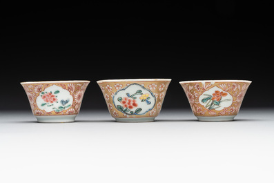 A varied collection of five Chinese famille rose cups and six saucers, Yongzheng/Qianlong