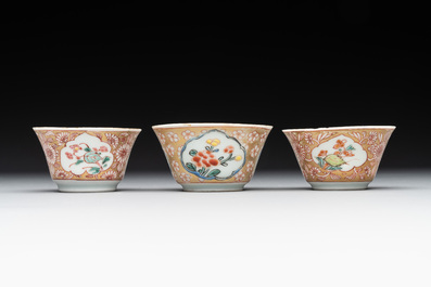 A varied collection of five Chinese famille rose cups and six saucers, Yongzheng/Qianlong