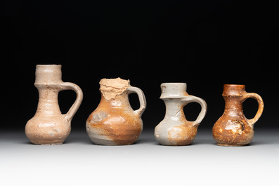 18 German stoneware jugs, mugs and vessels, 15th C. and later