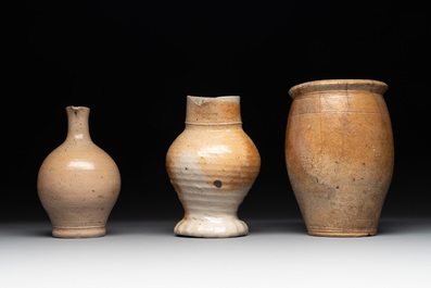 18 German stoneware jugs, mugs and vessels, 15th C. and later