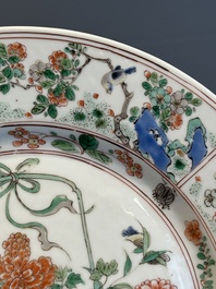 A Chinese famille verte 'flower basket' dish, ding mark, Kangxi
