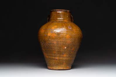 Three German stoneware jugs, including a bellarmine, and a French or English pottery jug, 17th C. and later