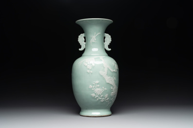 A Chinese slip-decorated celadon-glazed vase with floral design, Qianlong mark and of the period