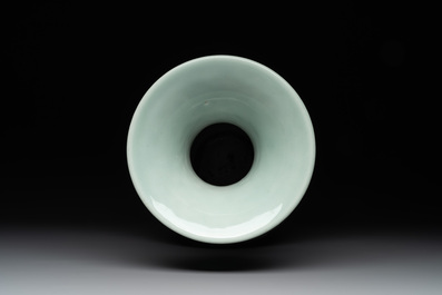 A Chinese slip-decorated celadon-glazed vase with floral design, Qianlong mark and of the period