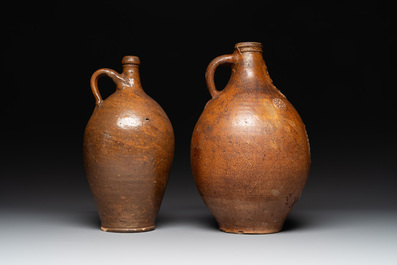 Three German stoneware jugs, including a bellarmine, and a French or English pottery jug, 17th C. and later
