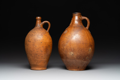 Three German stoneware jugs, including a bellarmine, and a French or English pottery jug, 17th C. and later