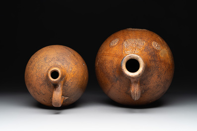 Three German stoneware jugs, including a bellarmine, and a French or English pottery jug, 17th C. and later