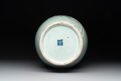 A Chinese slip-decorated celadon-glazed vase with floral design, Qianlong mark and of the period
