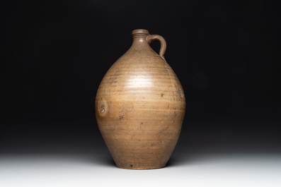 Three German stoneware jugs, including a bellarmine, and a French or English pottery jug, 17th C. and later