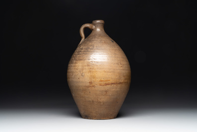Three German stoneware jugs, including a bellarmine, and a French or English pottery jug, 17th C. and later
