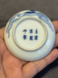 A pair of Chinese blue and white and a pair of blue, white and copper-red seal paste boxes, Kangxi and Qianlong mark, 19th C.