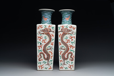 A pair of Chinese famille verte 'dragon' vases and wooden stands, Chenghua mark, 19th C.