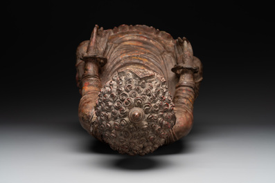 A Southeast Asian gilt-lacquered wooden sculpture of a praying ascetic, 18/19th C.