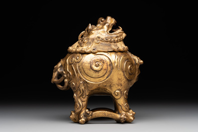 A finely cast Chinese gilt bronze 'luduan' incense burner and cover, Ming, 15/16th C.