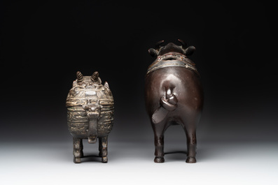 Two Chinese bronze buffalo-form vessels and covers, 'xizun 犧尊', Ming