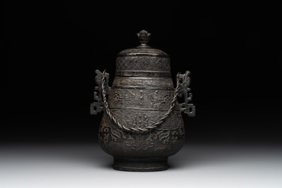 A Chinese archaistic bronze 'Taotie' wine vessel and cover, 'you 卣', Ming
