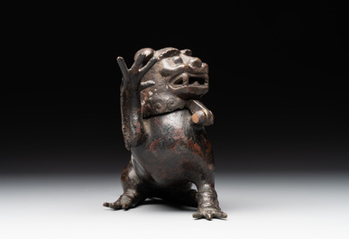A rare Chinese bronze lion-form incense burner and cover, Song/Ming