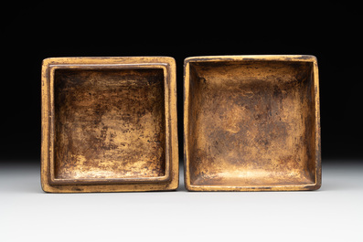 A Chinese square gilt bronze ink box and cover (印泥盒), Xuande mark and possibly of the period