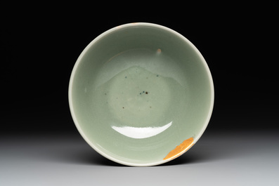 A Chinese Longquan celadon stem cup and two saucers, Ming