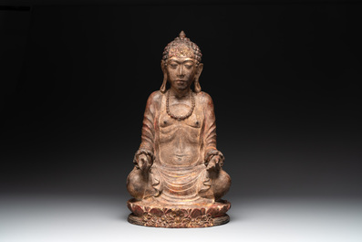 A Southeast Asian gilt-lacquered wooden sculpture of a praying ascetic, 18/19th C.