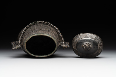A Chinese archaistic bronze 'Taotie' wine vessel and cover, 'you 卣', Ming